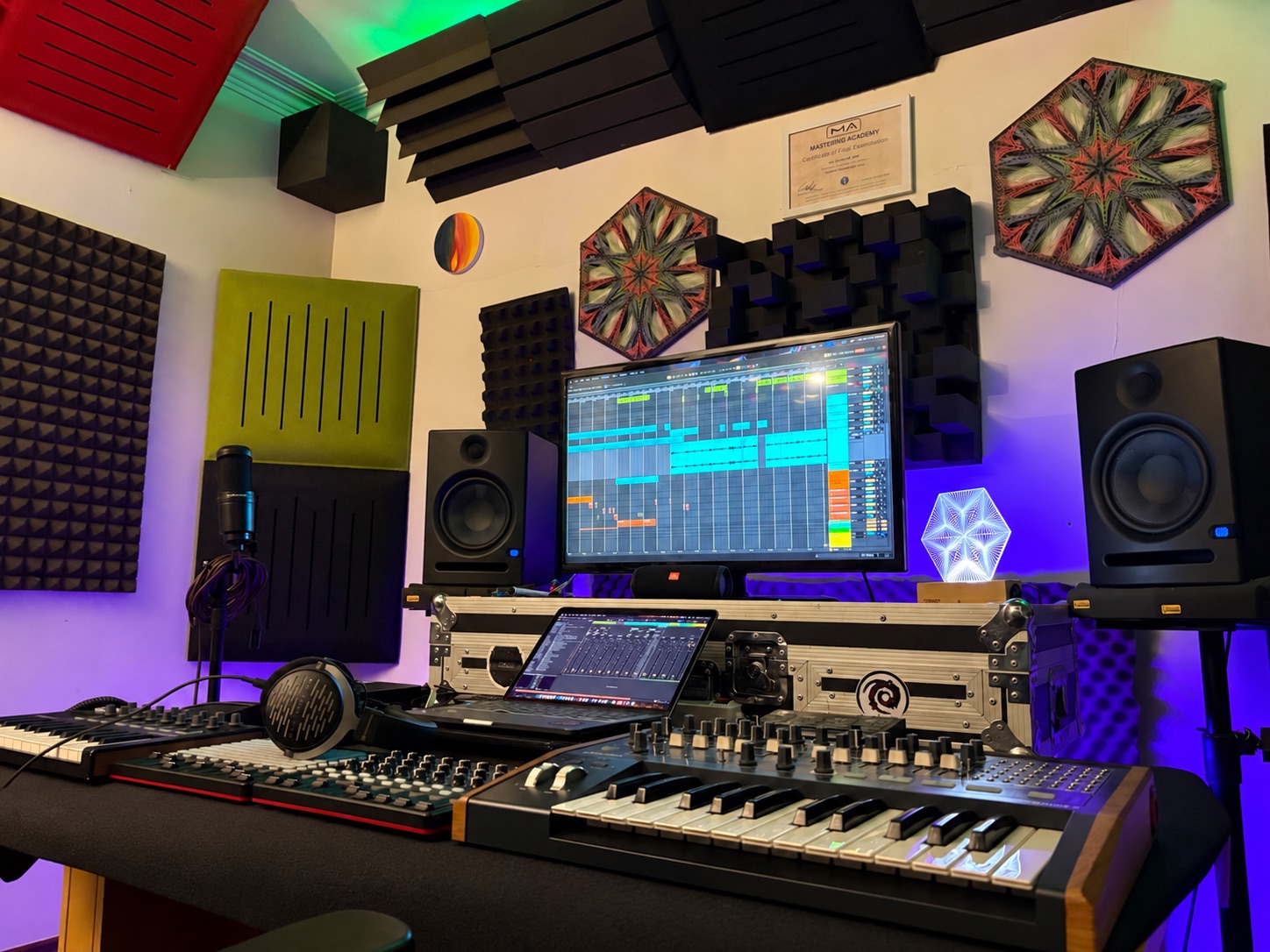 KOOROW studio with acoustic treatment, monitors and music production equipment